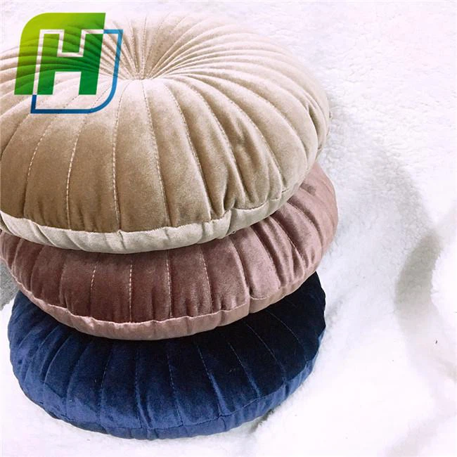 Shiny round velvet cushion